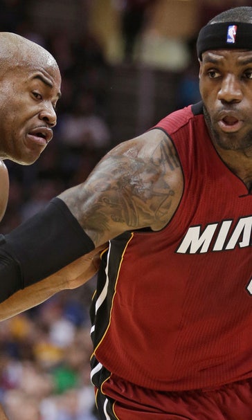 LeBron James starts strong, Heat hold off to Cavaliers on road